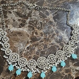 Light blue Necklace with silver touch
